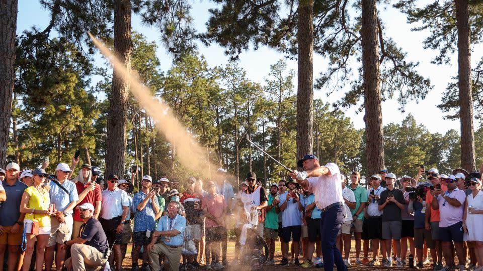 DeChambeau escapes the trees. - Gregory Shamus/Getty Images