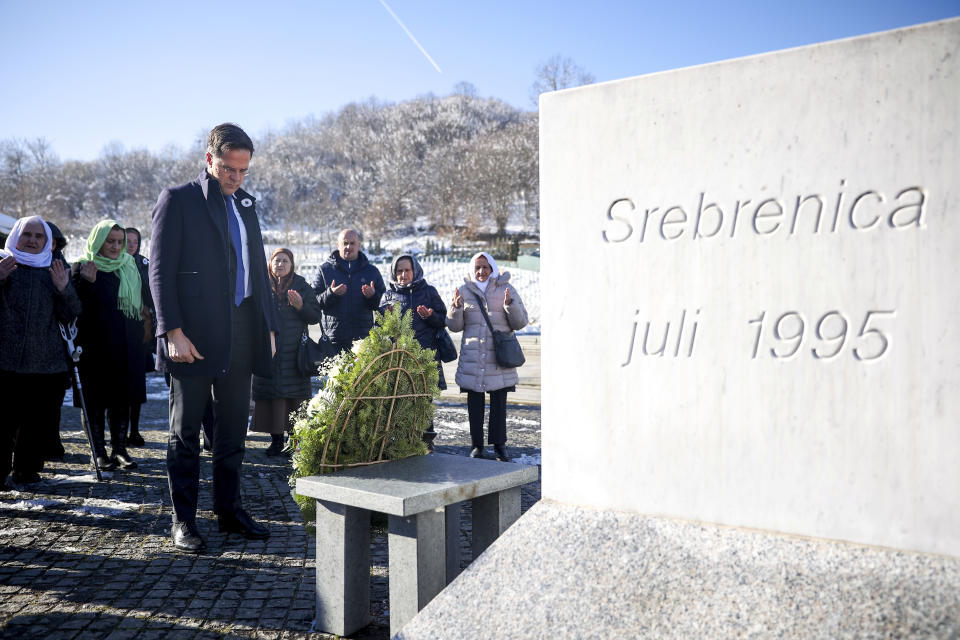 Prime Minister of the Netherlands, Mark Rutte, pays his respects after laying a wreath at the Srebrenica Memorial Center in Potocari, Bosnia, Monday, Jan. 22, 2024. (AP Photo/Armin Durgut)