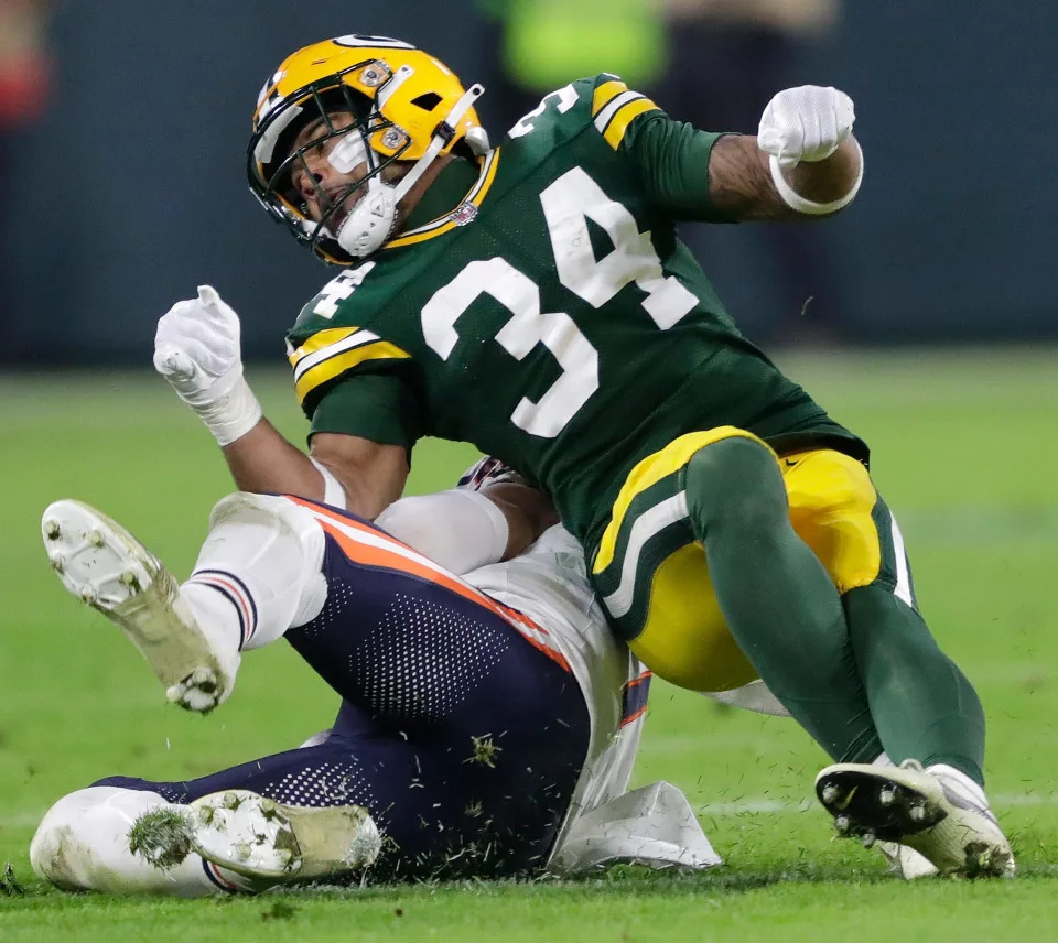 Green Bay Packers safety Jonathan Owens (34) puts a hit on <a class="link " href="https://sports.yahoo.com/nfl/teams/chicago/" data-i13n="sec:content-canvas;subsec:anchor_text;elm:context_link" data-ylk="slk:Chicago Bears;sec:content-canvas;subsec:anchor_text;elm:context_link;itc:0"&gtChicago Bears</a> quarterback <a class="link " href="https://sports.yahoo.com/nfl/players/33399" data-i13n="sec:content-canvas;subsec:anchor_text;elm:context_link" data-ylk="slk:Justin Fields;sec:content-canvas;subsec:anchor_text;elm:context_link;itc:0"&gtJustin Fields</a> (1) during their football game Sunday, January 7, 2024, in <a class="link " href="https://sports.yahoo.com/nfl/teams/green-bay/" data-i13n="sec:content-canvas;subsec:anchor_text;elm:context_link" data-ylk="slk:Green Bay;sec:content-canvas;subsec:anchor_text;elm:context_link;itc:0"&gtGreen Bay</a>, Wisconsin.