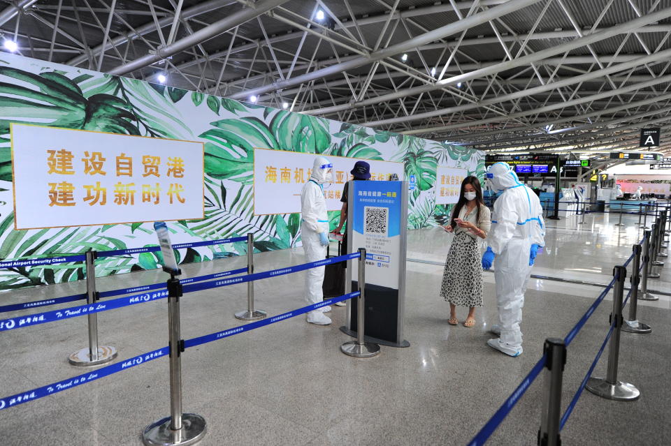 Small numbers of tourists were allowed to leave Hainan on Tuesday. Source: Getty