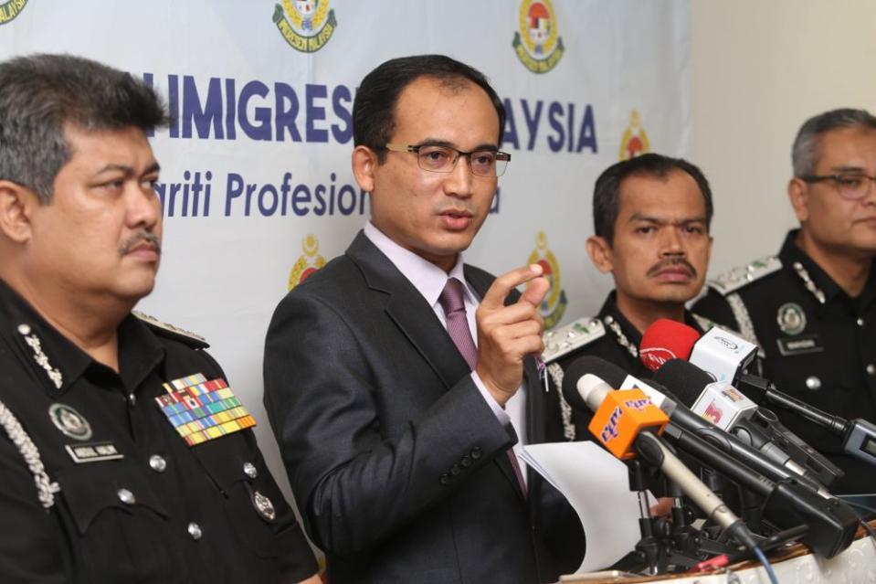 Immigration Department Director-General Datuk Khairul Dzaimee Daud speaks during a media conference in Putrajaya July 19, 2019. — Picture by Choo Choy May