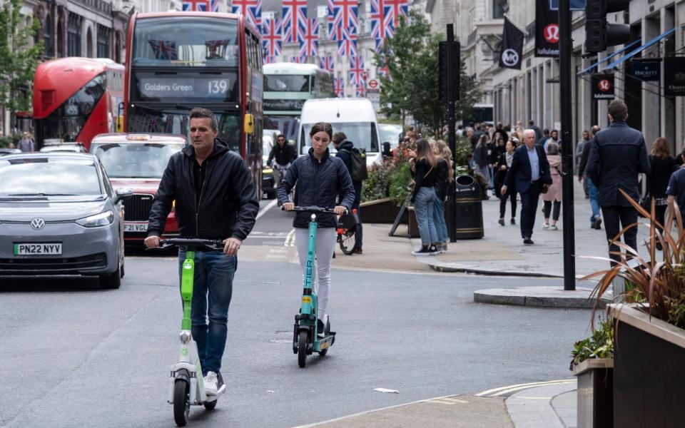 Escooter riders on Regent Street - Mike Kemp