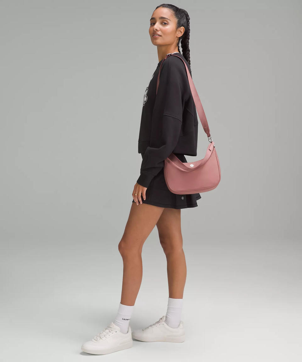 someone wearing the Adjustable Mini Shoulder Bag from Lululemon 