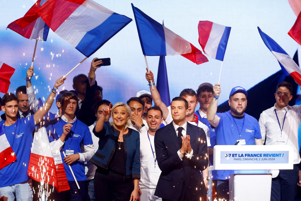 Marine Le Pen, President of the French far-right National Rally (Rassemblement National - RN) party parliamentary group, and Jordan Bardella, President of the French far-right National Rally (Rassemblement National - RN) party attend a political rally during the party's campaign for the EU elections on 2 June. (Reuters)