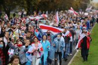 Belarusian opposition supporters hold a rally in Minsk