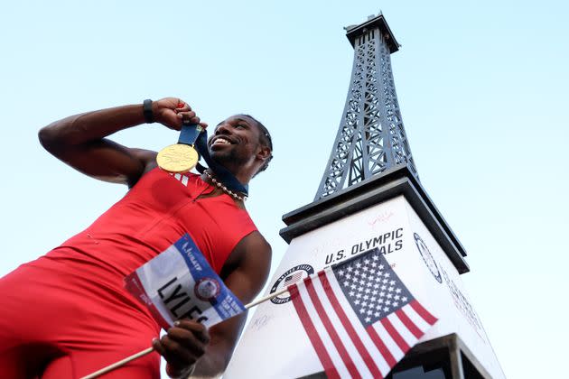 Noah Lyles celebrates with his U.S. Olympic trial gold medal after winning the 100 meters. 