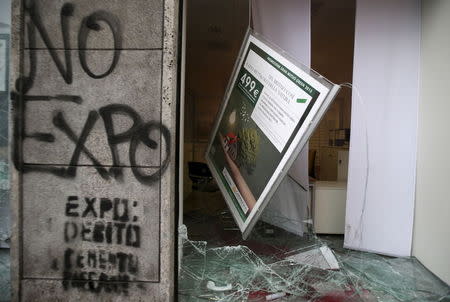 Bank Cariparma is seen destroyed by protesters during a rally against Expo 2015 in Milan, May 1, 2015. REUTERS/Stefano Rellandini