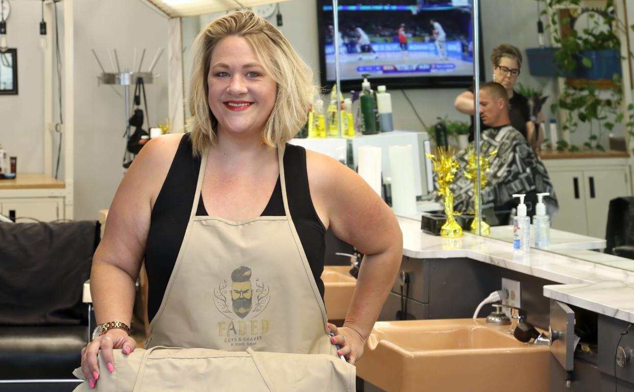 Owner Molly Prescott inside her shop, Faded Cuts and Shaves, on South South Street in Gastonia.