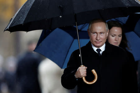 Russian President Vladimir Putin arrives to attend a commemoration ceremony for Armistice Day, 100 years after the end of the First World War at the Arc de Triomphe in Paris, France, November 11, 2018. REUTERS/Benoit Tessier/Pool