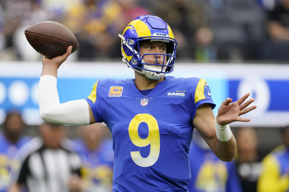 Los Angeles Rams quarterback Matthew Stafford (9) throws against the Carolina Panthers during the first half of an NFL football game Sunday, Oct. 16, 2022, in Inglewood, Calif. (AP Photo/Ashley Landis)