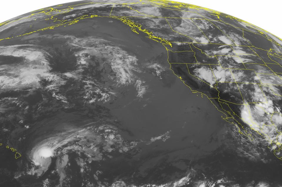 This NOAA satellite image taken Monday, July 29, 2013 at 1:45 a.m. EDT shows a stationary front across eastern Colorado, central Wyoming and into western Montana. Showers and thunderstorms are scattered across the Great Basin, and the Central/Northern Rockies. A surface trough is producing showers and a few thunderstorms over New Mexico and western Texas. Tropical Storm Flossie is approaching the Big Island of Hawaii with max winds of 60 mph. Slow weakening is forecast in the next 24 hours. (AP Photo/Weather Underground)