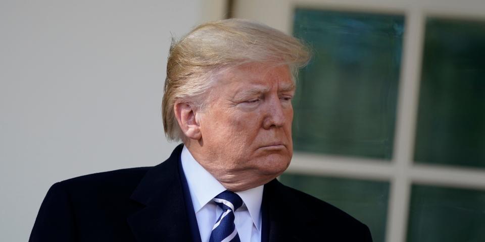 President Donald Trump pauses as he walks with Israeli Prime Minister Benjamin Netanyahu to a meeting in the Oval Office of the White House, Monday, Jan. 27, 2020, in Washington. (AP Photo/ Evan Vucci)