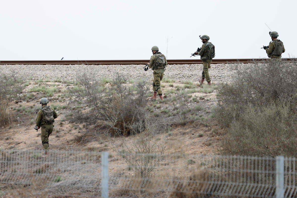 Israeli soldiers patrol on the outskirts of Sderot near the border with Gaza (AFP via Getty Images)