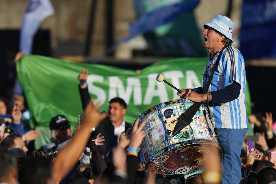 Supporters of Sergio Massa, Argentine Economy Minister and ruling party presidential candidate cheer during a campaign event in Buenos Aires, Argentina, Tuesday, Oct. 17, 2023. Argentine general elections are set for Oct. 22. (AP Photo/Natacha Pisarenko)