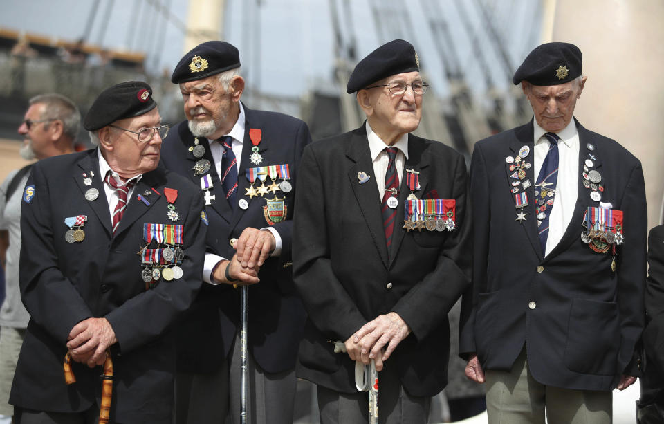 D-Day veterans gather during a D-Day commemoration event at the Historical Dockyard in Portsmouth, southern England, Sunday June 2, 2019. There are many events over the coming days to mark the 75th anniversary of the landings by the Allied forces on Tuesday June 6, 1944, in Normandy, France, that became known as D-Day. (Andrew Matthews/PA via AP)