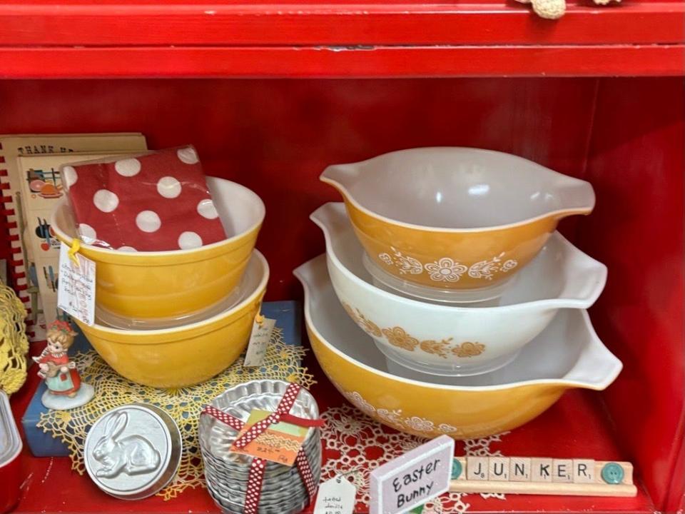 A collection of vintage Pyrex bowls sit untouched at antique store Here We Go Again in Abilene, Wednesday, April 3, 2024. Owners say that Pyrex bowls are one of the most prized finds when antique shopping and are a hot commodity to customers.