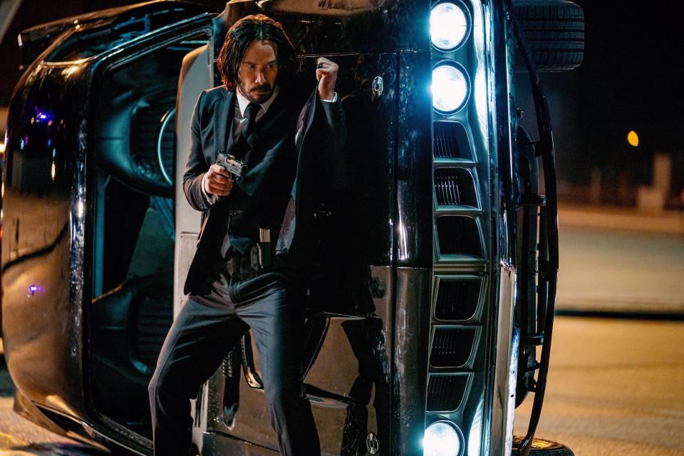 Keanu Reeves dodging everything at the Arc de Triomphe in 'John Wick: Chapter 4.'