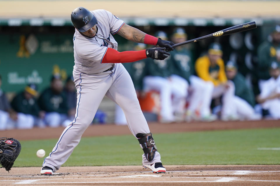 Miami Marlins' Jesús Aguilar strikes out against the Oakland Athletics during the first inning of a baseball game in Oakland, Calif., Tuesday, Aug. 23, 2022. (AP Photo/Godofredo A. Vásquez)