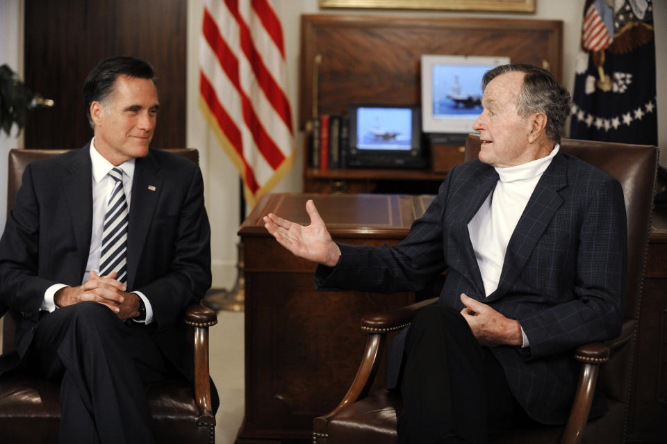 Republican presidential candidate and former Massachusetts Gov. Mitt Romney, left, meets with former President George H.W. Bush to receive his endorsement Thursday, March 29, 2012, in Houston. (AP Photo/Pat Sullivan)