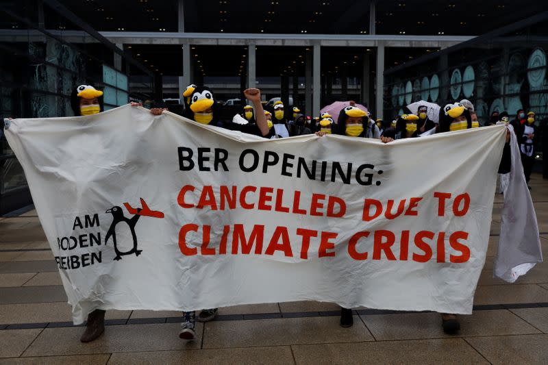 Protest against the official opening of the new Berlin-Brandenburg Airport in Schoenefeld