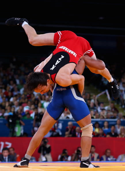 LONDON, ENGLAND - AUGUST 12: Sushil Kumar of India in action against Akzhurek Tanatarov of Kazakhstan during the Men's Freestyle Wrestling 66kg semi final match on Day 16 of the London 2012 Olympic Games at ExCeL on August 12, 2012 in London, England. (Photo by Ryan Pierse/Getty Images)