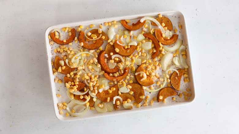 corn and squash on a baking sheet