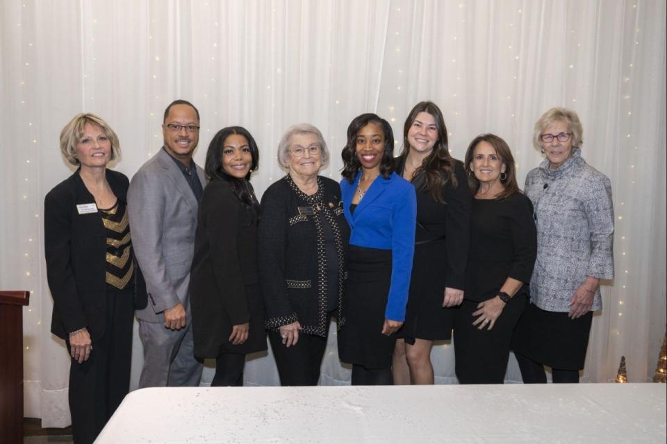 Brittany L.B. Eddy, shown fifth from the left in a blue top, recently was elected the first Black woman to lead the Women's Council of Realtors Columbus as the organization's president. Pictured during the Dec. 5 ceremony to recognize Eddy as president are, from left: Realtors Jan Jedlinksy and Michael Jones, Franklin County Commissioner Erica Crawley and Realtors Barbara Lach, Eddy, Sarah Martie, Gloria Cannon and Sue Lusk-Gleich.