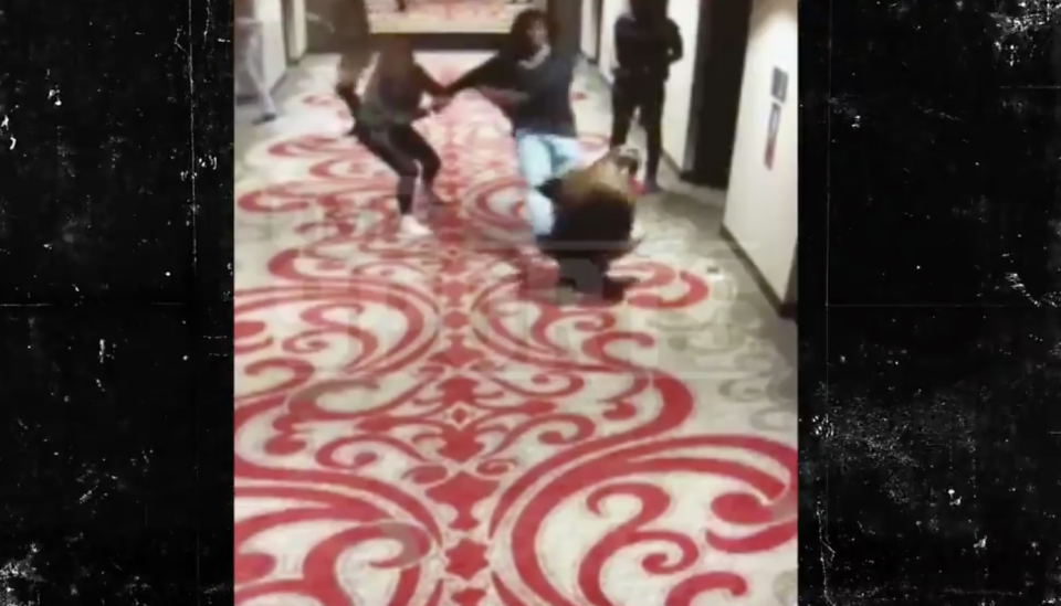 Video of Kansas City Chiefs running back Kareem Hunt shoving and kicking a young woman at a Cleveland hotel in February was published by TMZ on Friday. (Screengrab)