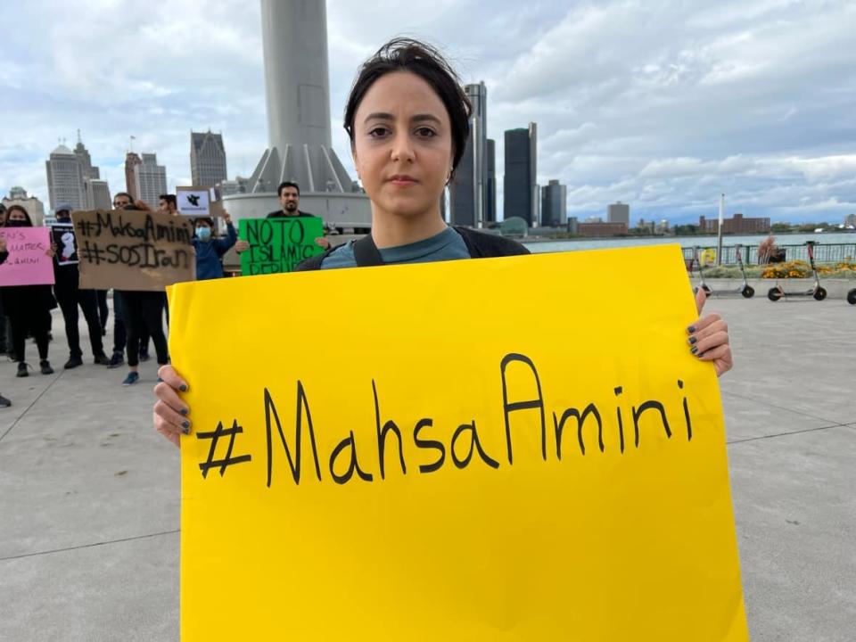 Naz Reihani took part in Sunday's protest and hopes it will send a message that everybody should have the freedom to wear and say what they want. (Jacob Barker/CBC - image credit)