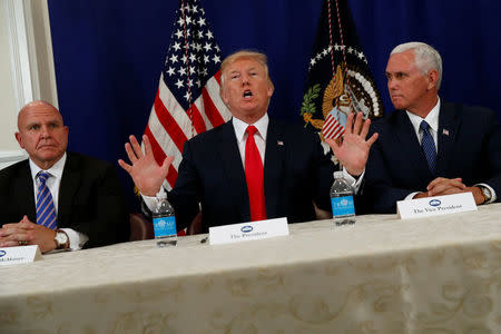 U.S. President Donald Trump speaks to reporters after a security briefing with National Security Adviser H.R. McMaster (L) and ?Vice President Mike Pence? (R) at Trump's golf estate in Bedminster, New Jersey U.S. August 10, 2017. REUTERS/Jonathan Ernst