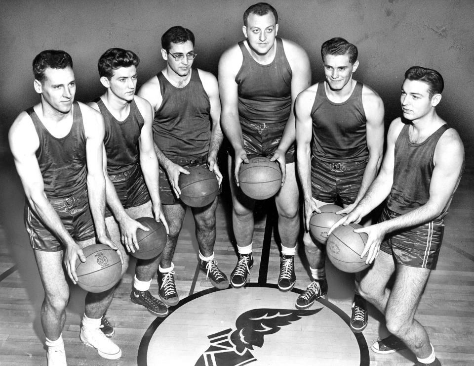 North High School graduate John Collver, far right, with the 1950-51 Goodyear Wingfoots.