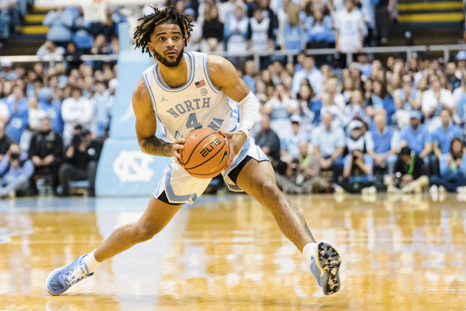 North Carolina guard R.J. Davis (4) looks to pass in the first half of an NCAA college basketball game against Notre Dame on Saturday, Jan. 7, 2023, in Chapel Hill, N.C. (AP Photo/Jacob Kupferman)