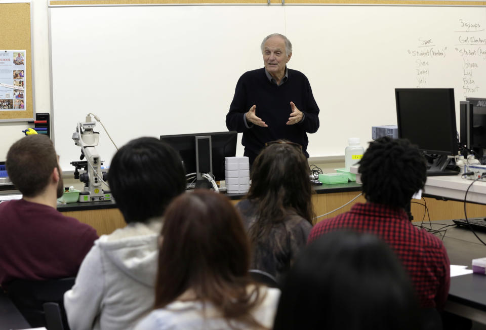 In this Friday, April 26, 2013 photo, actor Alan Alda addresses a Communicating Science class on the campus of Stony Brook University, on New York's Long Island. The film and television star is trying to encourage scientists of all disciplines to ditch the jargon and speak in plain English. (AP Photo/Richard Drew)