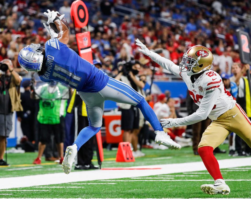 Detroit Lions wide receiver Kalif Raymond (11) makes a catch against San Francisco 49ers cornerback Ambry Thomas (20) during the second half at Ford Field in Detroit on Sunday, Sept. 12, 2021.