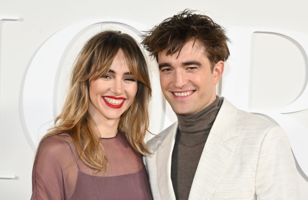 Suki Waterhouse and Robert Pattinson December 2022 Getty