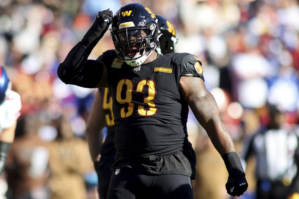 FILE - Washington Commanders defensive tackle Jonathan Allen (93) celebrates during an NFL football game against the New York Giants, Sunday, November 19, 2023 in Landover, Md. Jonathan Allen is one of Washington's longest-tenured players on a roster that saw significant upheaval in the first offseason with a new regime running the show. (AP Photo/Daniel Kucin Jr., File)