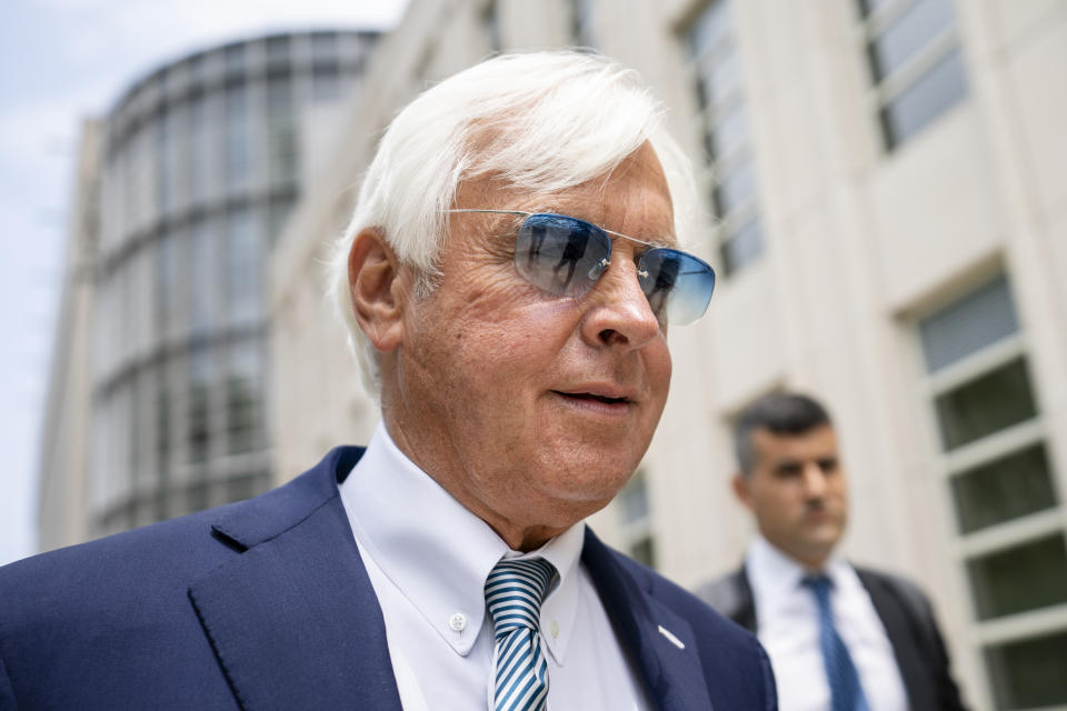 FILE - Horse trainer Bob Baffert leaves federal court July 12, 2021, in the Brooklyn borough of New York. Split-sample urine testing of Kentucky Derby winner Medina Spirit has shown that a steroid present in the colt’s system came from a topical ointment and not an injection, according to an attorney for Baffert. (AP Photo/John Minchillo, File)