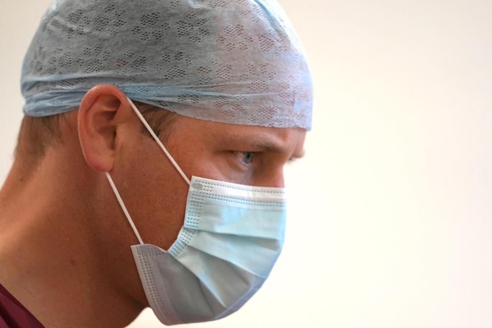 The Duke of Cambridge looks at a screen to follow the robotic microwave ablation procedure during his visit to the Royal Marsden Hospital