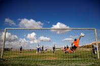 Players from Israeli soccer clubs affiliated with Israel Football Association, Ariel Municipal Soccer Club and Maccabi HaSharon Netanya, play against each other at Ariel Municipal Soccer Club's training grounds in the West Bank Jewish settlement of Ariel September 23, 2016. Picture taken September 23, 2016. REUTERS/Amir Cohen