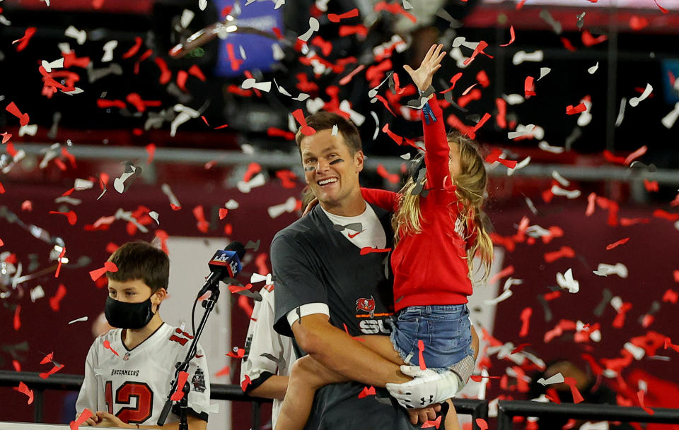 TAMPA, FLORIDA - FEBRUARY 07: Tom Brady #12 of the Tampa Bay Buccaneers celebrates with his daughter Vivian Brady after defeating the Kansas City Chiefs in Super Bowl LV at Raymond James Stadium on February 07, 2021 in Tampa, Florida. The Buccaneers defeated the Chiefs 31-9. (Photo by Kevin C. Cox/Getty Images)