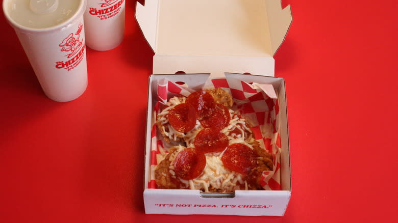 KFC chizza in pizza box 