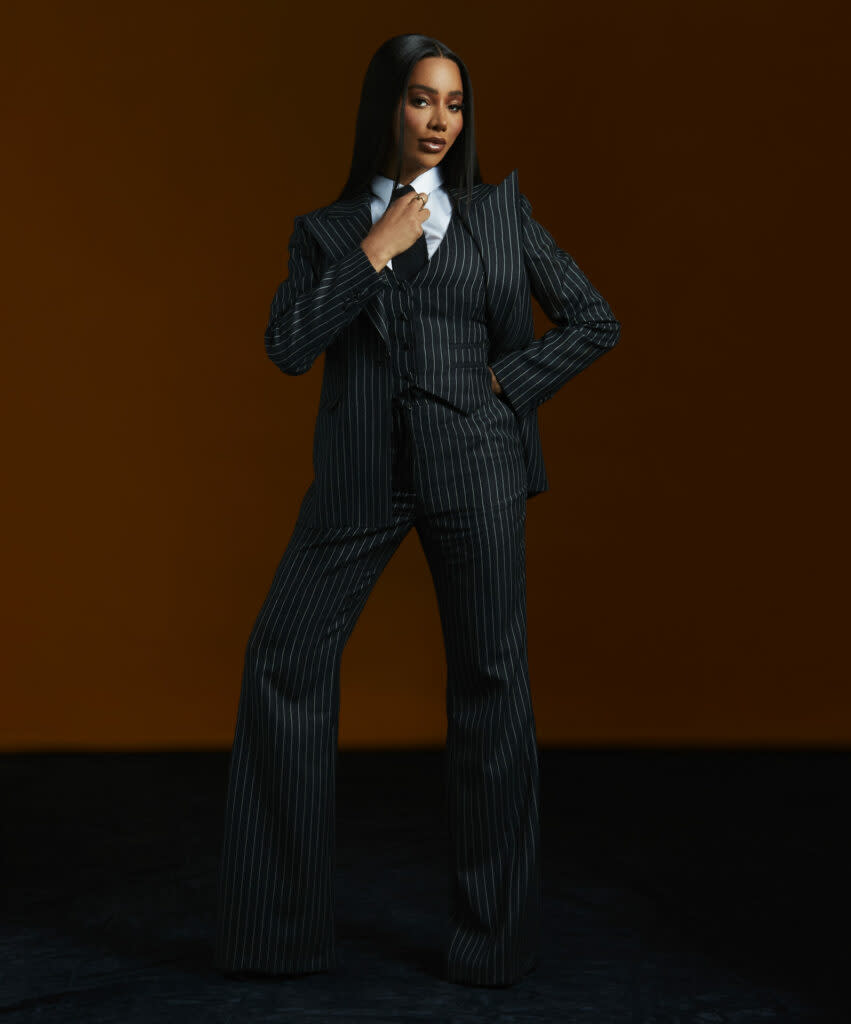 Munroe wears suit by Gabriela Hearst, tie and shirt stylists own, jewellery David Morris and shoes Jimmy Choo, photography by Jordan Rossi. Hair by Jay Birmingham, make up by Bianca Spencer. Styling by Thomas George Wulbern