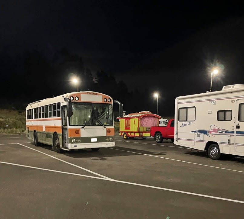 school bus parked in lot during the night