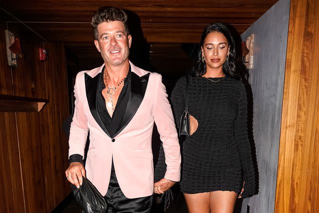 Claude Yao Sahi @hijoshotit / SplashNews.com Robin Thicke and April Love Geary