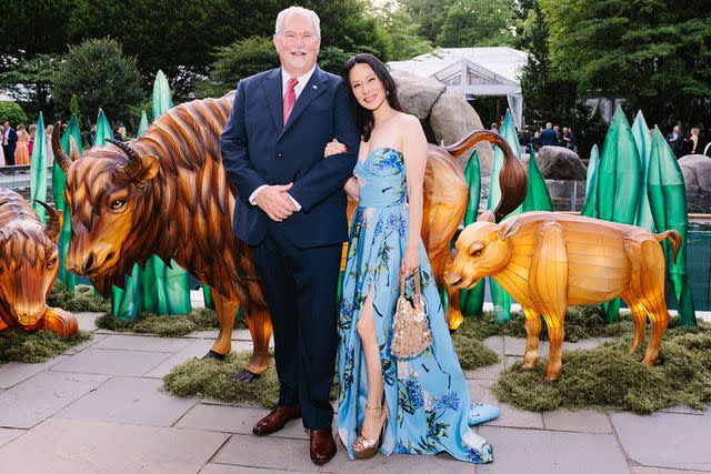 <p>Yvonne Tnt/BFA.com</p> Lucy Liu and Jim Breheny