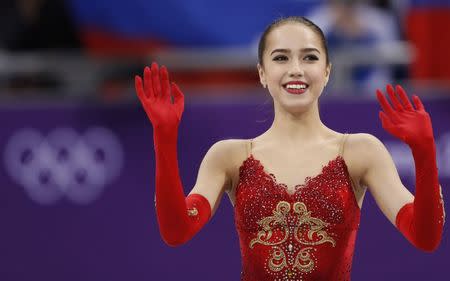 Figure Skating - Pyeongchang 2018 Winter Olympics - Women Single Skating free skating competition final - Gangneung Ice Arena - Gangneung, South Korea - February 23, 2018 - Gold medallist Alina Zagitova, an Olympic Athlete from Russia, waves. REUTERS/Damir Sagolj