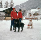 <p>The young <strong>Princess Chulabhorn of Thailand</strong> takes a load off on a sled in <strong>Gstaad, Switzerland,</strong> accompanied by two older boys and her fluffy pooch in January 1960.</p>