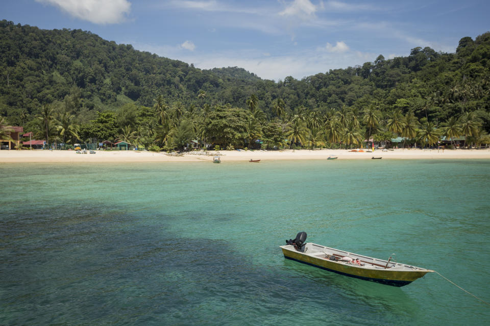 Boat and beach Tioman Island.