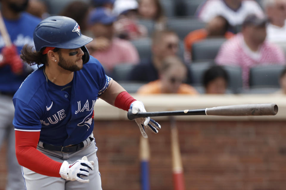 Toronto Blue Jays' Bo Bichette hits an two-RBI single in the sixth inning against the New York Mets during a baseball game Sunday, July 25, 2021, in New York. (AP Photo/Adam Hunger)