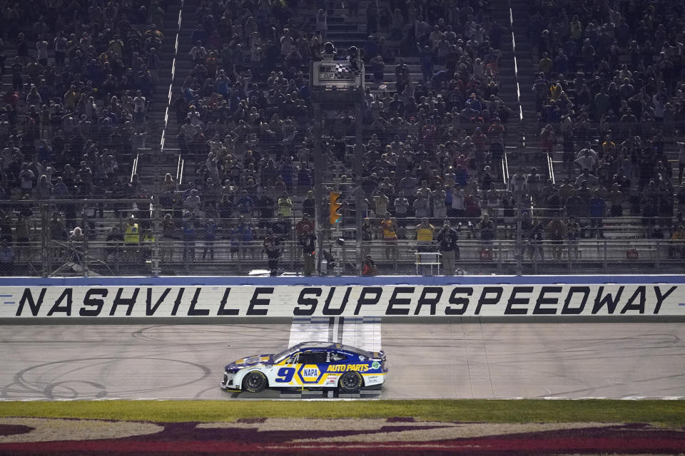 Chase Elliott crosses the finish line to win a NASCAR Cup Series auto race Sunday, June 26, 2022, in Lebanon, Tenn. (AP Photo/Mark Humphrey)